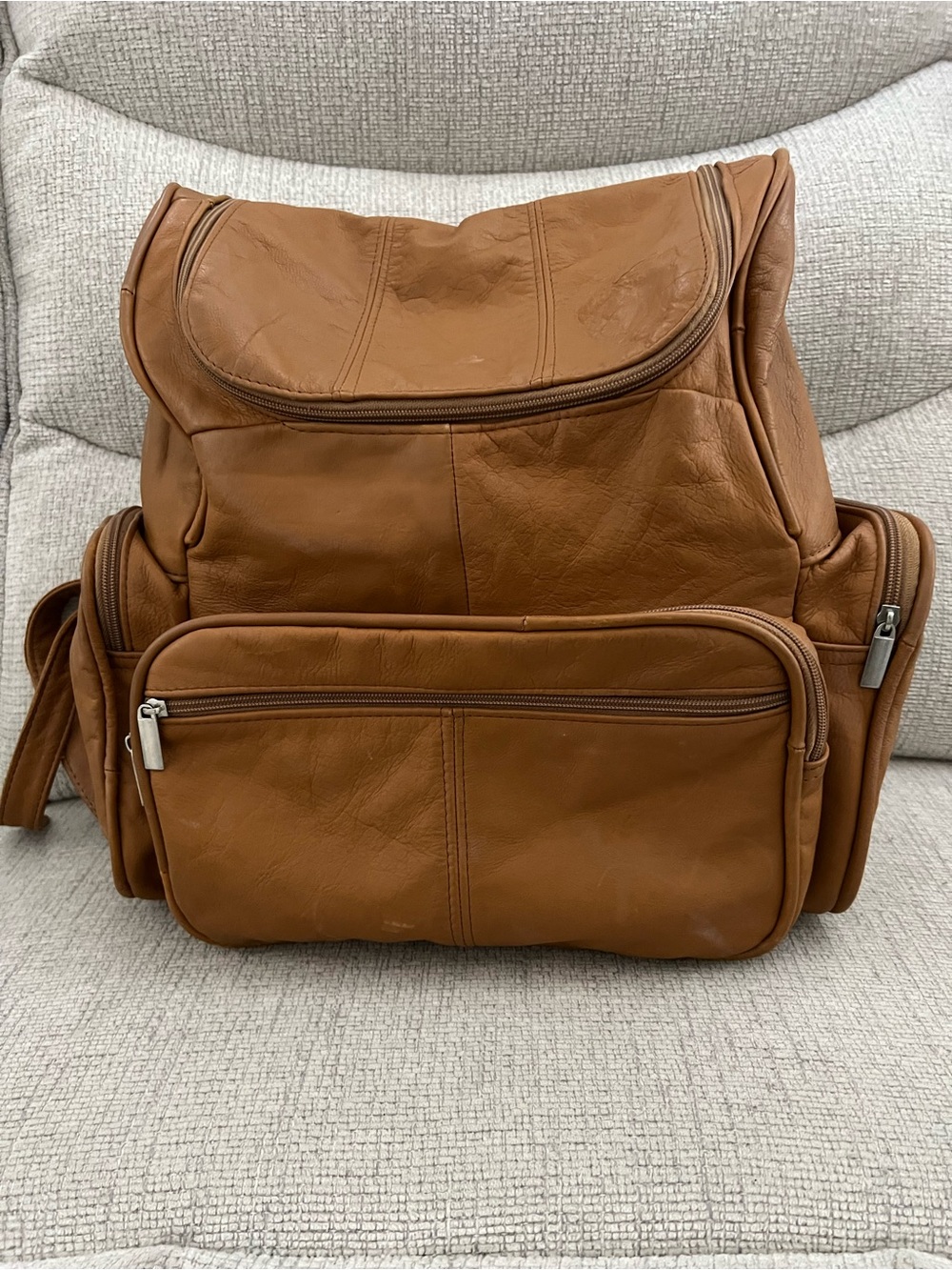 Unisex Caramel Soft genuine leather large backpack 5 zippers, silver hardware